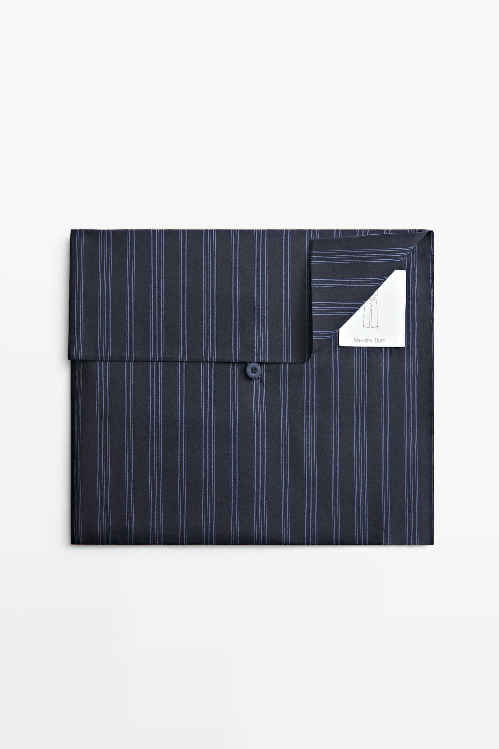 Short sleeve pyjama top and striped trousers